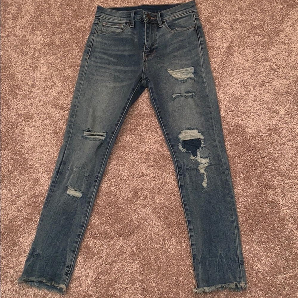 Distressed ripped jeans